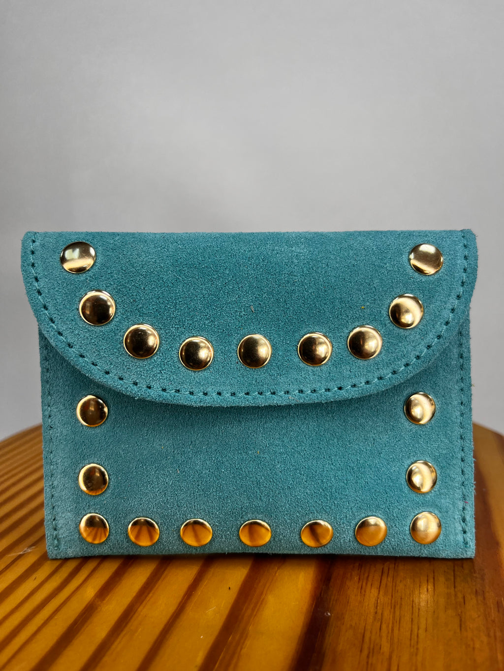 CARTERA TACHUELAS AZUL CLARO