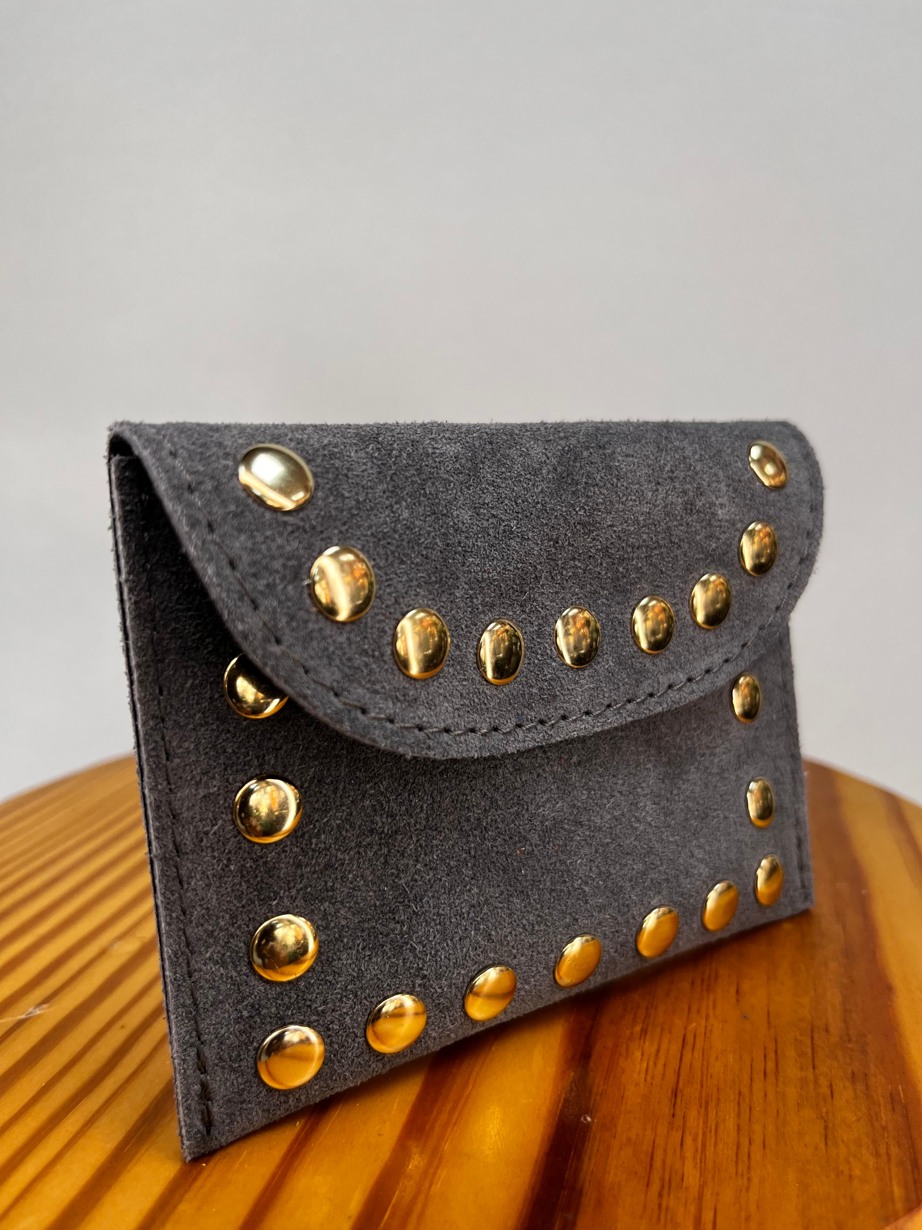 CARTERA TACHUELAS GRIS