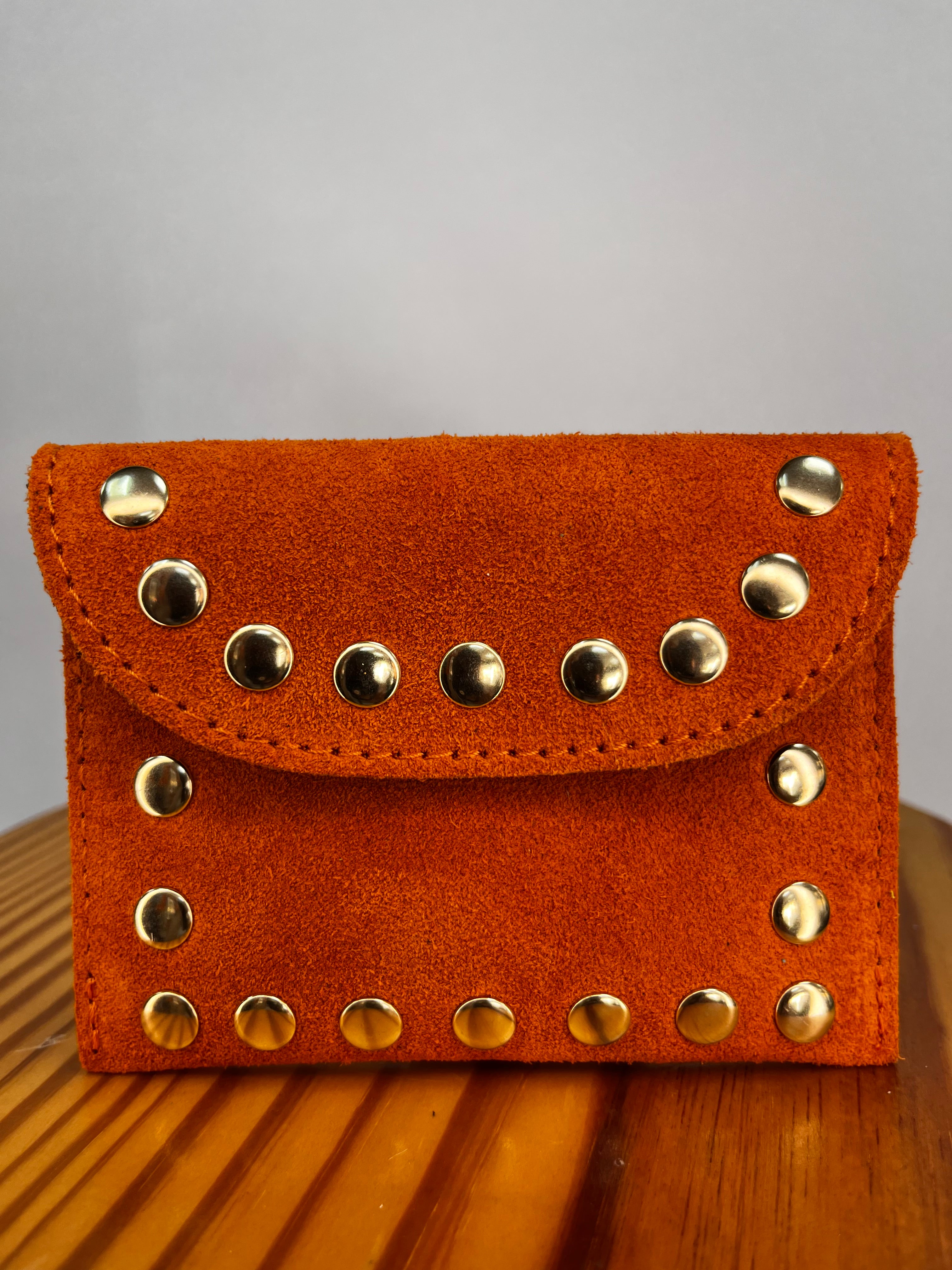 CARTERA TACHUELAS NARANJA