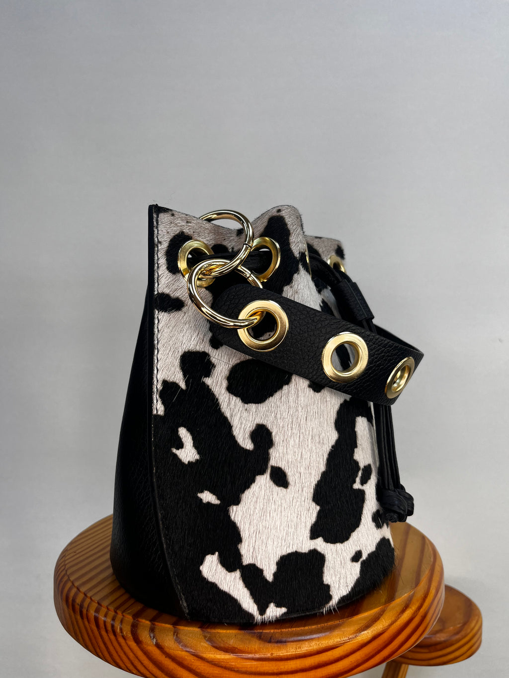 BOLSO BOMBONERA MINI VACA