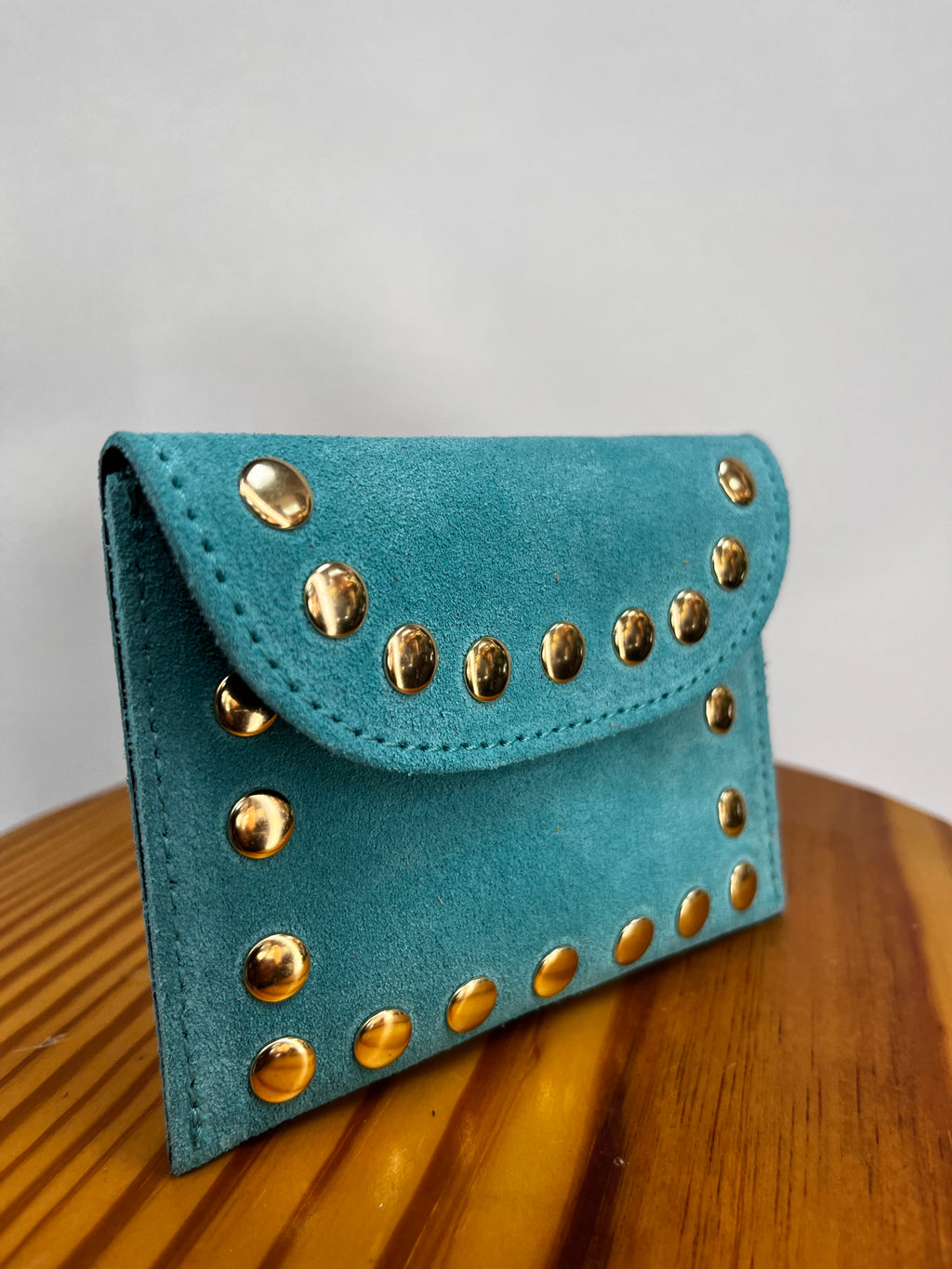 CARTERA TACHUELAS AZUL CLARO